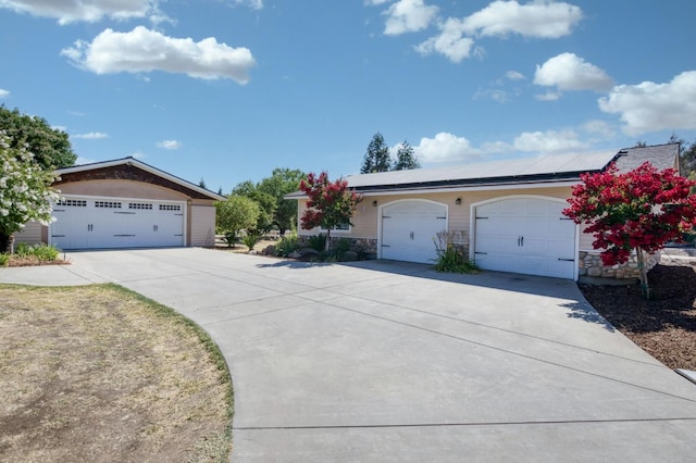 10311 E San Jose Ave, Clovis, CA 93619 - ranch-style home with solar panels and stone siding