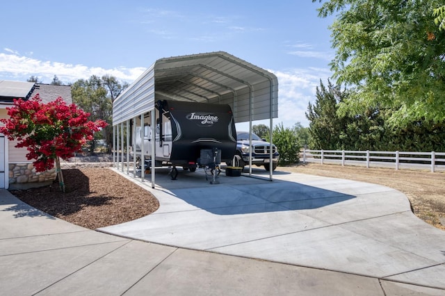 10311 E San Jose Ave, Clovis, CA 93619 - exterior space with a detached carport and concrete driveway