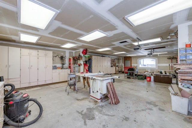 10311 E San Jose Ave, Clovis, CA 93619 - garage with a workshop area