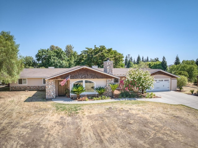 10311 E San Jose Ave, Clovis, CA 93619 - single story home featuring a chimney, stone siding, driveway, and a front lawn