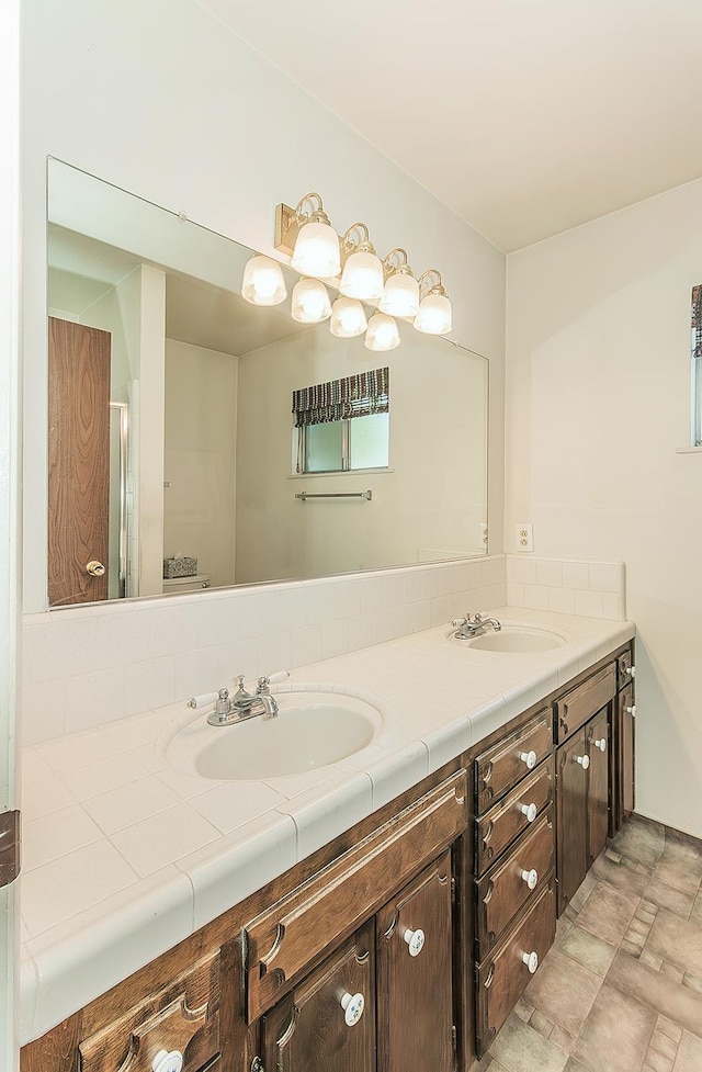 4368 N Hughes Ave, Fresno, CA 93705 - full bath featuring double vanity and an enclosed shower