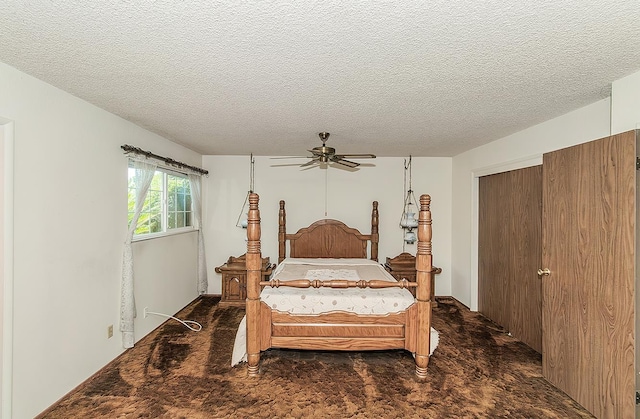 4368 N Hughes Ave, Fresno, CA 93705 - carpeted bedroom with a textured ceiling, a ceiling fan, and a closet