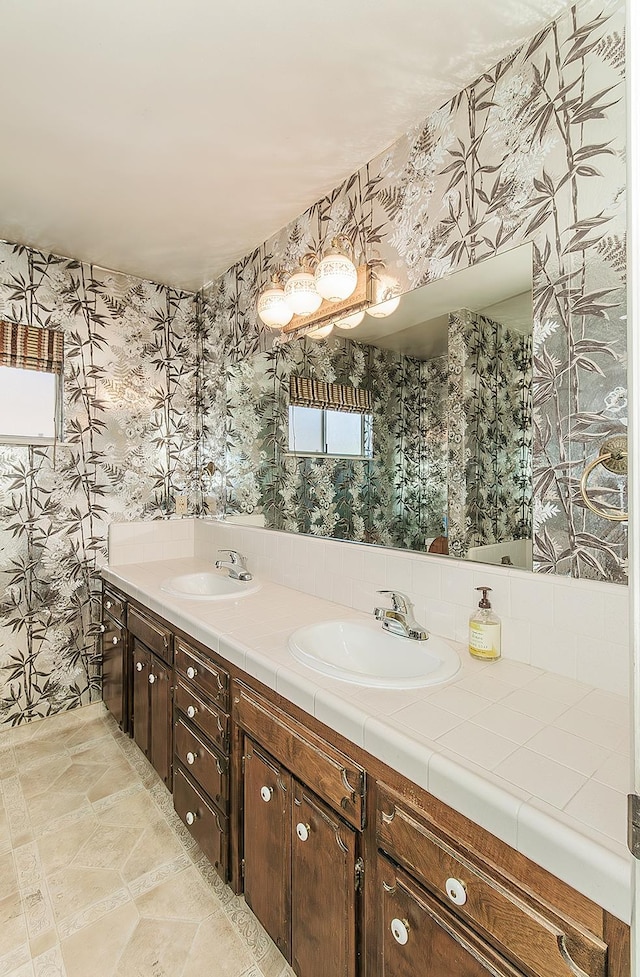 4368 N Hughes Ave, Fresno, CA 93705 - full bathroom featuring wallpapered walls and double vanity