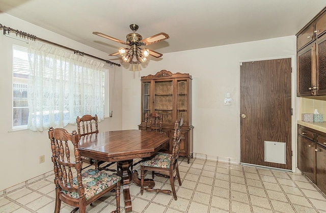 4368 N Hughes Ave, Fresno, CA 93705 - dining room featuring ceiling fan, healthy amount of natural light, and light floors