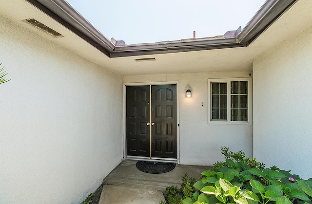 4368 N Hughes Ave, Fresno, CA 93705 - doorway to property with stucco siding