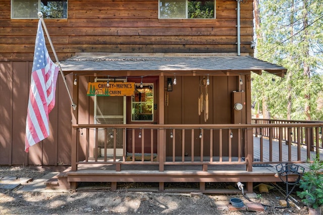 44800 Mountain Meadow Rd, Oakhurst, CA 93644 - view of exterior entry featuring a wooden deck