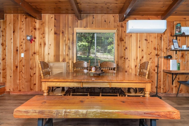 44800 Mountain Meadow Rd, Oakhurst, CA 93644 - dining area featuring a wall mounted air conditioner, wood finished floors, a wooden ceiling with exposed beams, and wooden walls