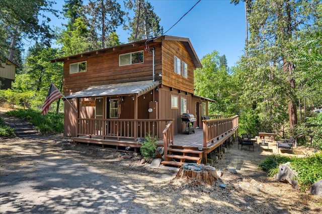 44800 Mountain Meadow Rd, Oakhurst, CA 93644 - view of front facade with a deck