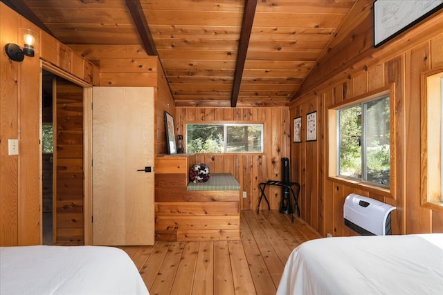44800 Mountain Meadow Rd, Oakhurst, CA 93644 - bedroom with wooden ceiling, wood walls, and light wood-style flooring