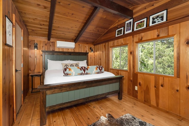 44800 Mountain Meadow Rd, Oakhurst, CA 93644 - bedroom with wooden ceiling, hardwood / wood-style floors, an AC wall unit, and wood walls