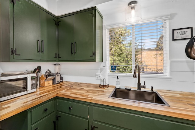 44800 Mountain Meadow Rd, Oakhurst, CA 93644 - kitchen with butcher block counters and green cabinetry