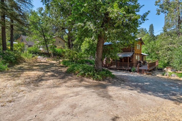 44800 Mountain Meadow Rd, Oakhurst, CA 93644 - view of yard with a deck and dirt driveway