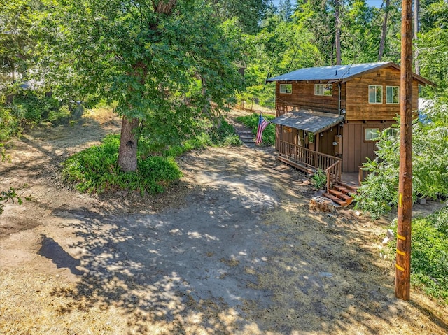 44800 Mountain Meadow Rd, Oakhurst, CA 93644 - view of yard featuring driveway and a wooden deck
