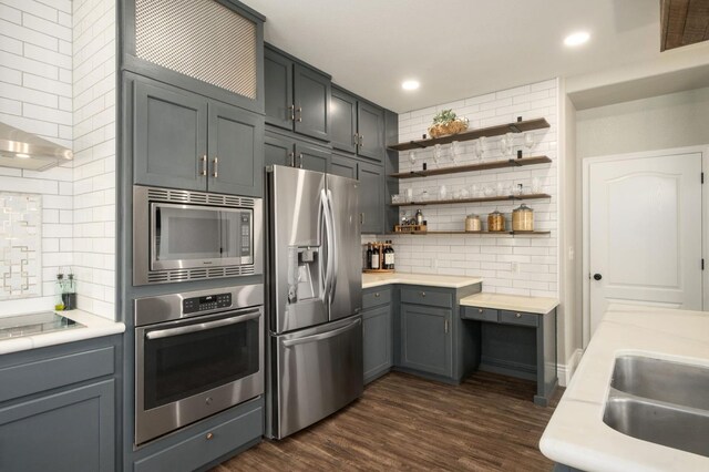 632 W Palo Alto Ave, Clovis, CA 93612 - kitchen with stainless steel appliances, decorative backsplash, open shelves, light countertops, and gray cabinets