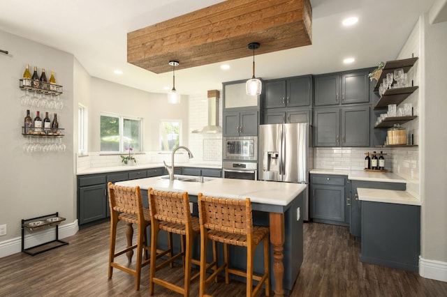 632 W Palo Alto Ave, Clovis, CA 93612 - kitchen with stainless steel appliances, wall chimney exhaust hood, light countertops, tasteful backsplash, and open shelves