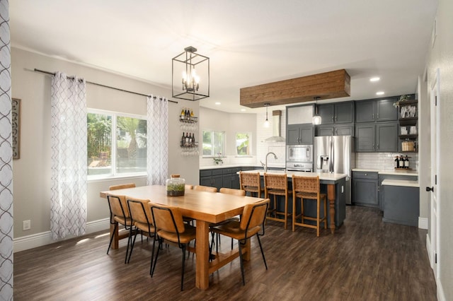 632 W Palo Alto Ave, Clovis, CA 93612 - dining space with plenty of natural light, dark wood-style flooring, recessed lighting, and a chandelier