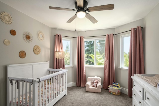 632 W Palo Alto Ave, Clovis, CA 93612 - bedroom featuring a crib, light colored carpet, and ceiling fan