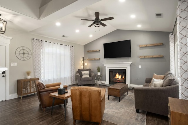 632 W Palo Alto Ave, Clovis, CA 93612 - living room with dark wood-style flooring, a glass covered fireplace, ceiling fan, vaulted ceiling, and recessed lighting