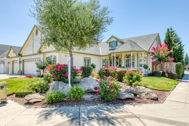 212 W Everglade Ave, Clovis, CA 93619 - view of front facade with an attached garage, a front yard, roof with shingles, and a porch