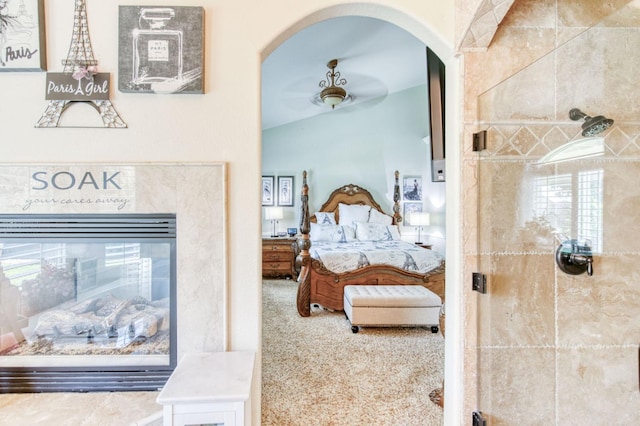 212 W Everglade Ave, Clovis, CA 93619 - carpeted bedroom with arched walkways and multiple windows