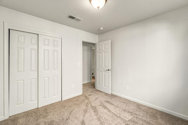 840 Morris Ln, Madera, CA 93637 - unfurnished bedroom with carpet and a closet