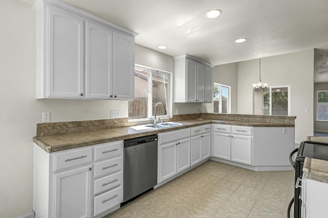 840 Morris Ln, Madera, CA 93637 - kitchen featuring stainless steel dishwasher, black / electric stove, a peninsula, a chandelier, and decorative light fixtures