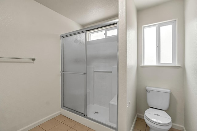 840 Morris Ln, Madera, CA 93637 - bathroom featuring a shower stall and tile patterned flooring