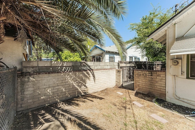 4430 E Iowa Ave, Fresno, CA 93702 - view of yard with a gate