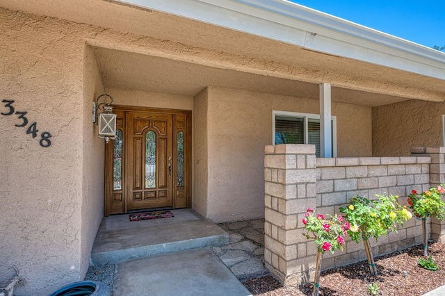 3348 W Sierra Ave, Fresno, CA 93711 - doorway to property featuring stucco siding