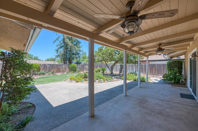 3348 W Sierra Ave, Fresno, CA 93711 - fenced backyard with ceiling fan and a patio area