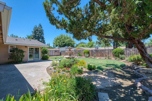 3348 W Sierra Ave, Fresno, CA 93711 - fenced backyard with a patio area