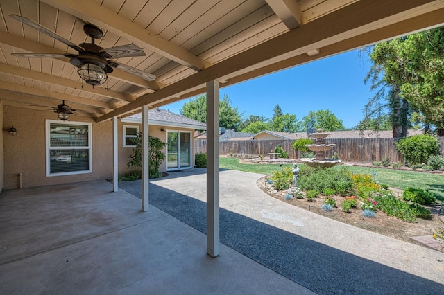 3348 W Sierra Ave, Fresno, CA 93711 - fenced backyard with a ceiling fan and a patio area