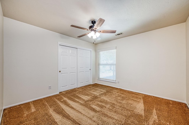 3348 W Sierra Ave, Fresno, CA 93711 - unfurnished bedroom with carpet floors, a closet, and a ceiling fan