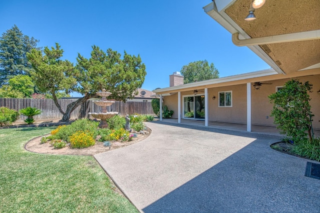 3348 W Sierra Ave, Fresno, CA 93711 - view of yard with ceiling fan and a patio