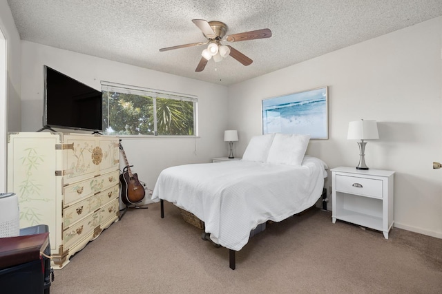 1446 Pico Ave, Clovis, CA 93611 - bedroom featuring light carpet, a textured ceiling, and a ceiling fan