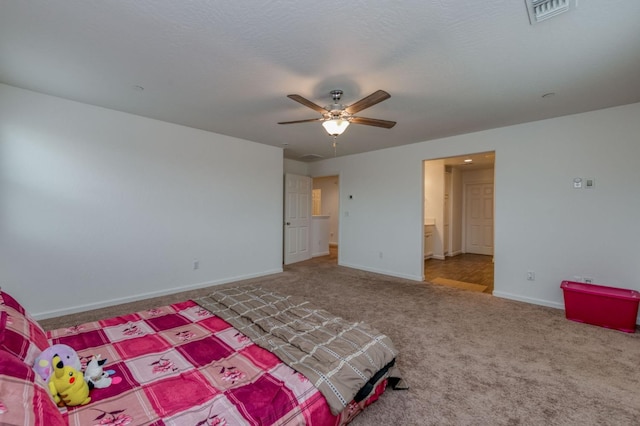 14288 W El Mar Ave, Kerman, CA 93630 - unfurnished bedroom featuring carpet, a ceiling fan, and connected bathroom