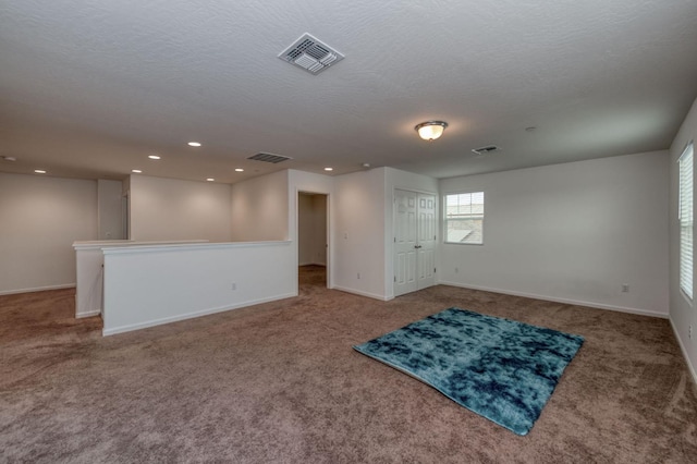 14288 W El Mar Ave, Kerman, CA 93630 - below grade area featuring carpet flooring and recessed lighting
