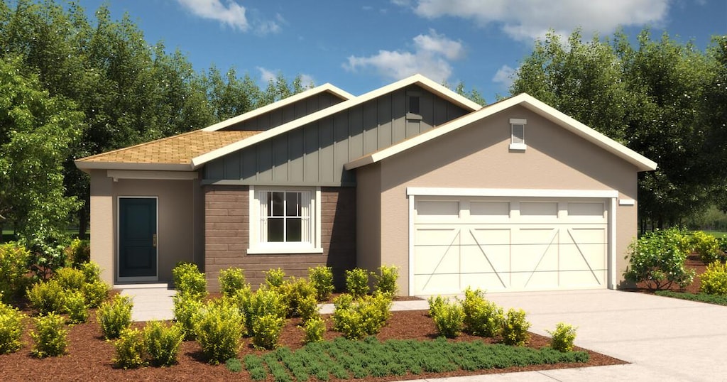 1444 Clara Ave, Fowler, CA 93625 - craftsman house with a garage, board and batten siding, concrete driveway, and a shingled roof
