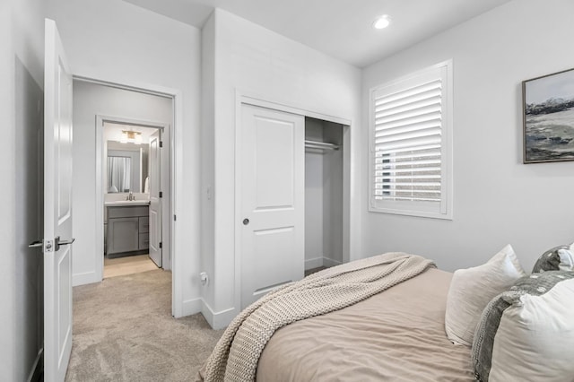 4349 Hillside Rd, Madera, CA 93636 - bedroom featuring light colored carpet, a closet, and recessed lighting