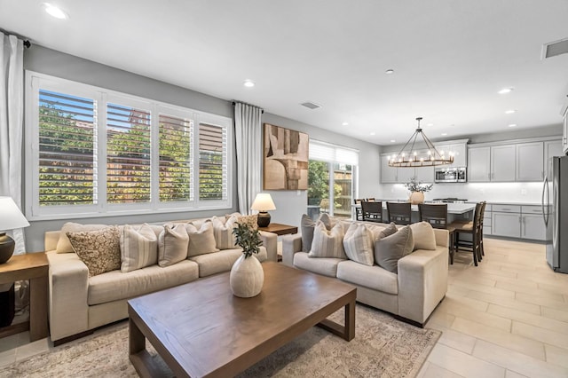 4349 Hillside Rd, Madera, CA 93636 - living area featuring a chandelier and recessed lighting