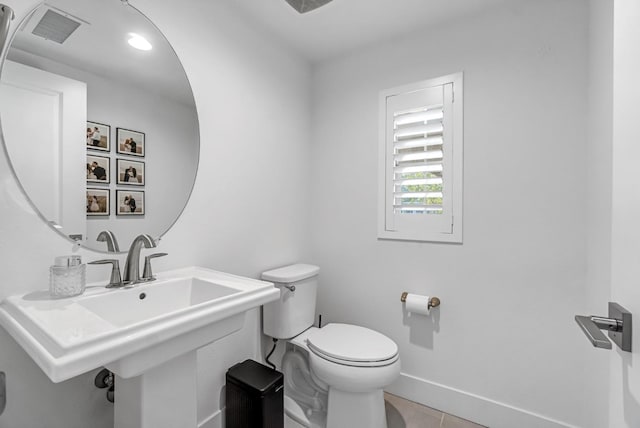 4349 Hillside Rd, Madera, CA 93636 - half bath with toilet and tile patterned floors