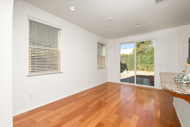 1935 N Glen Alva Ln, Clovis, CA 93619 - spare room with light wood finished floors and recessed lighting
