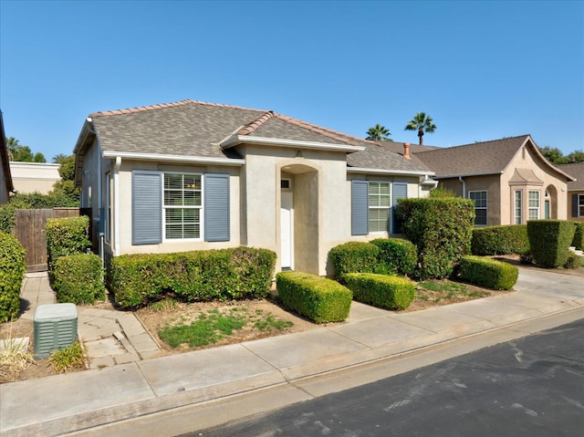 1935 N Glen Alva Ln, Clovis, CA 93619 - view of front of house featuring stucco siding and roof with shingles
