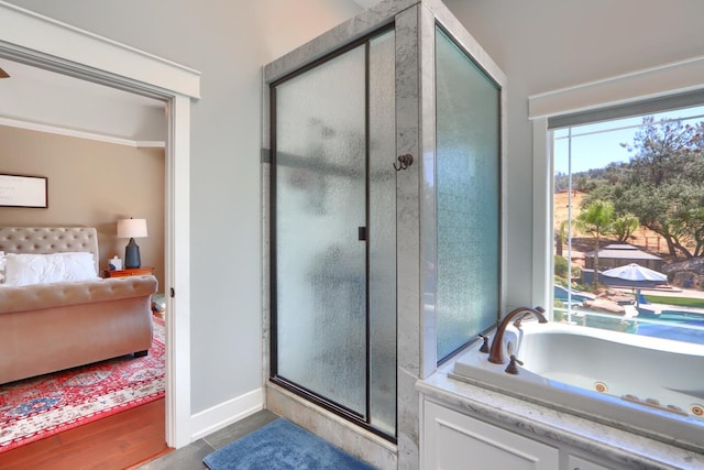 43295 Running Deer Dr, Coarsegold, CA 93614 - full bathroom with connected bathroom, a shower stall, and a whirlpool tub