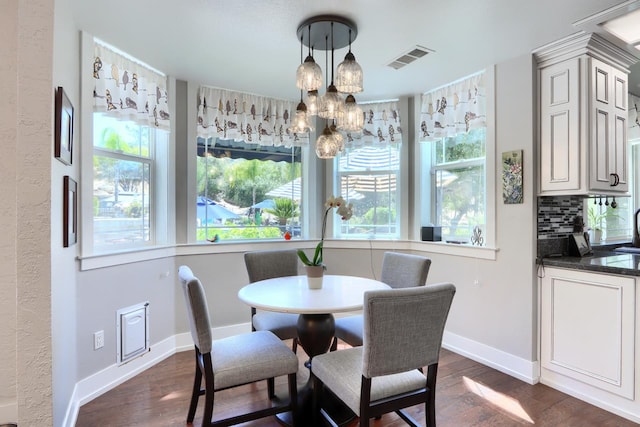 43295 Running Deer Dr, Coarsegold, CA 93614 - dining room featuring a chandelier and dark wood-style flooring