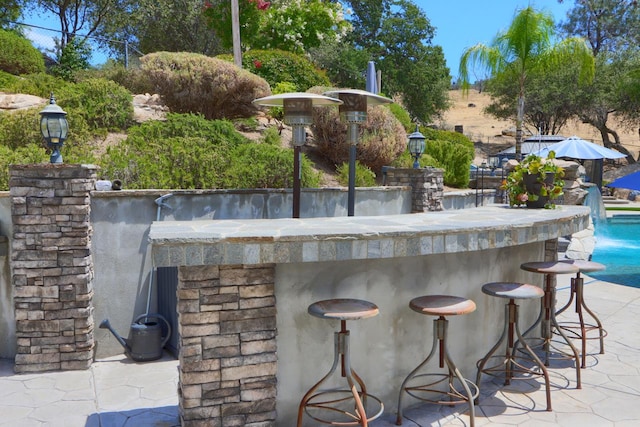 43295 Running Deer Dr, Coarsegold, CA 93614 - view of patio / terrace featuring an outdoor pool