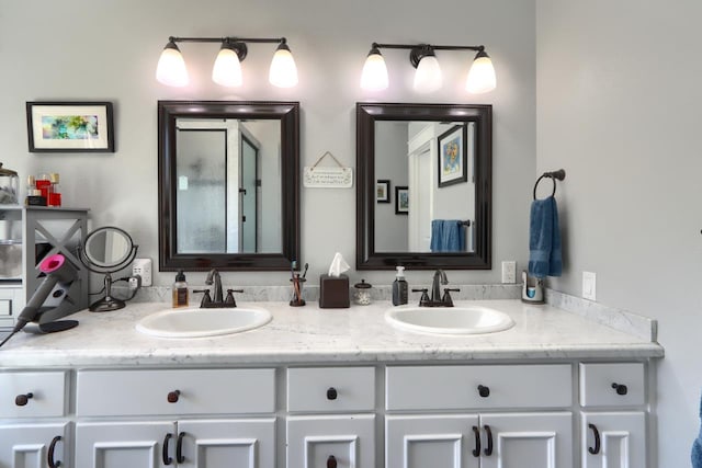 43295 Running Deer Dr, Coarsegold, CA 93614 - full bathroom with double vanity and a shower with door