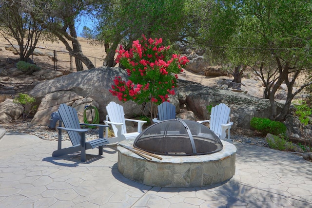 43295 Running Deer Dr, Coarsegold, CA 93614 - view of patio featuring a fire pit