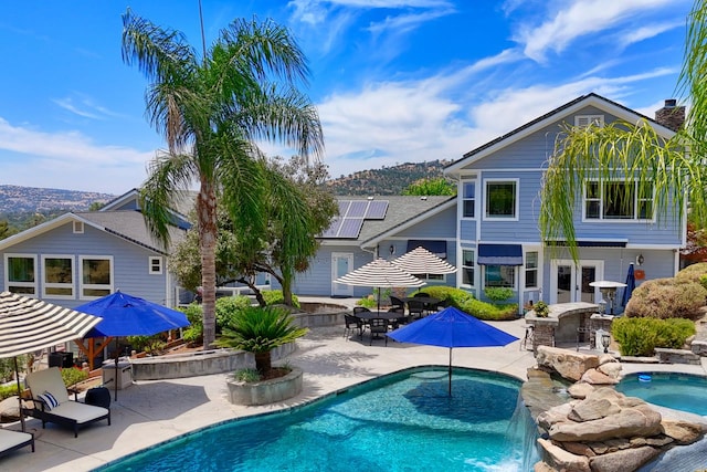 43295 Running Deer Dr, Coarsegold, CA 93614 - outdoor pool featuring a patio, outdoor dining area, and an outdoor hot tub