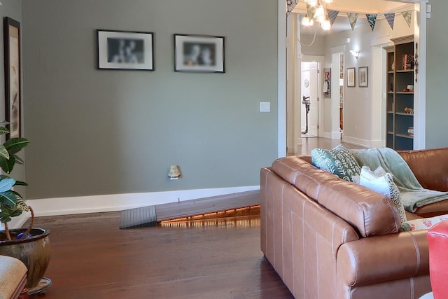 43295 Running Deer Dr, Coarsegold, CA 93614 - living room featuring baseboards and wood finished floors